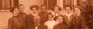 The E.A. Poe Family circa 1910. Seated in front are E.A. Poe and Josephine Poe. Their children from Left to Right: Dixie, James, Josie, Allan, Helen, Hilda, Margaret and Lillie.