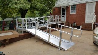 (Installed with two landings, multiple rails & multiple threshold plates.)