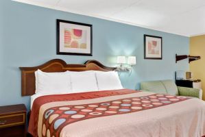 Guest room at the Super 8 by Wyndham Raleigh Downtown in Raleigh, North Carolina