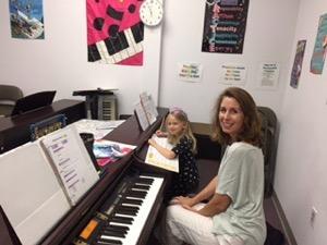 harp lessons raleigh KinderVillage Music Studio